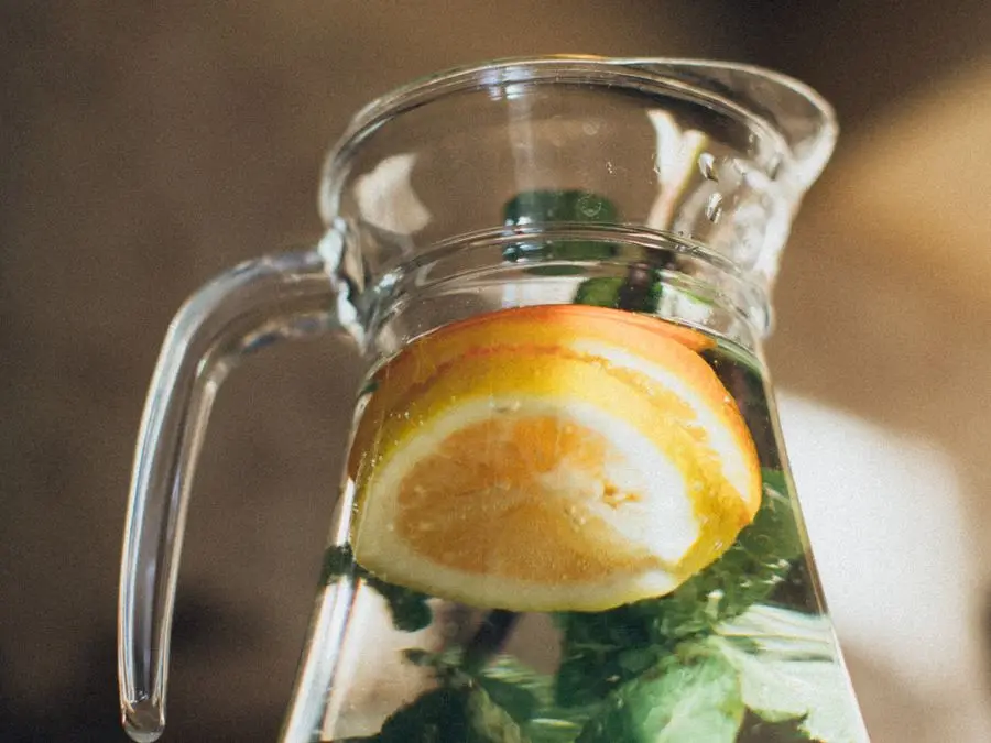 A pitcher of citrus and mint infused water