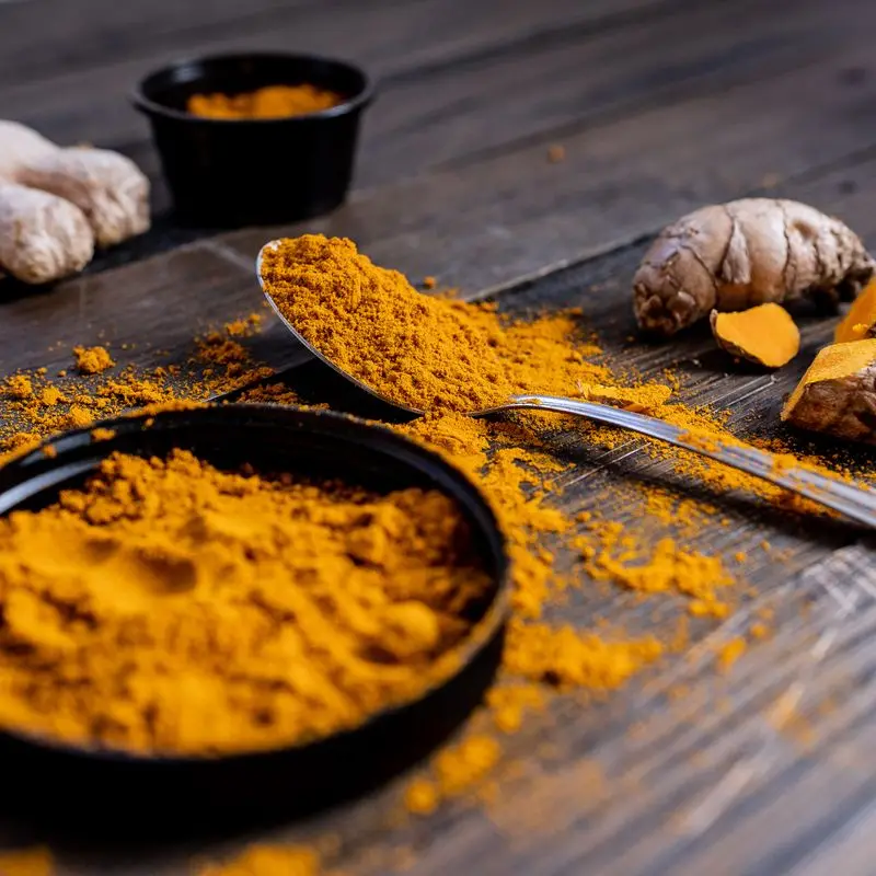 Fresh ginger root and ground turmeric powder