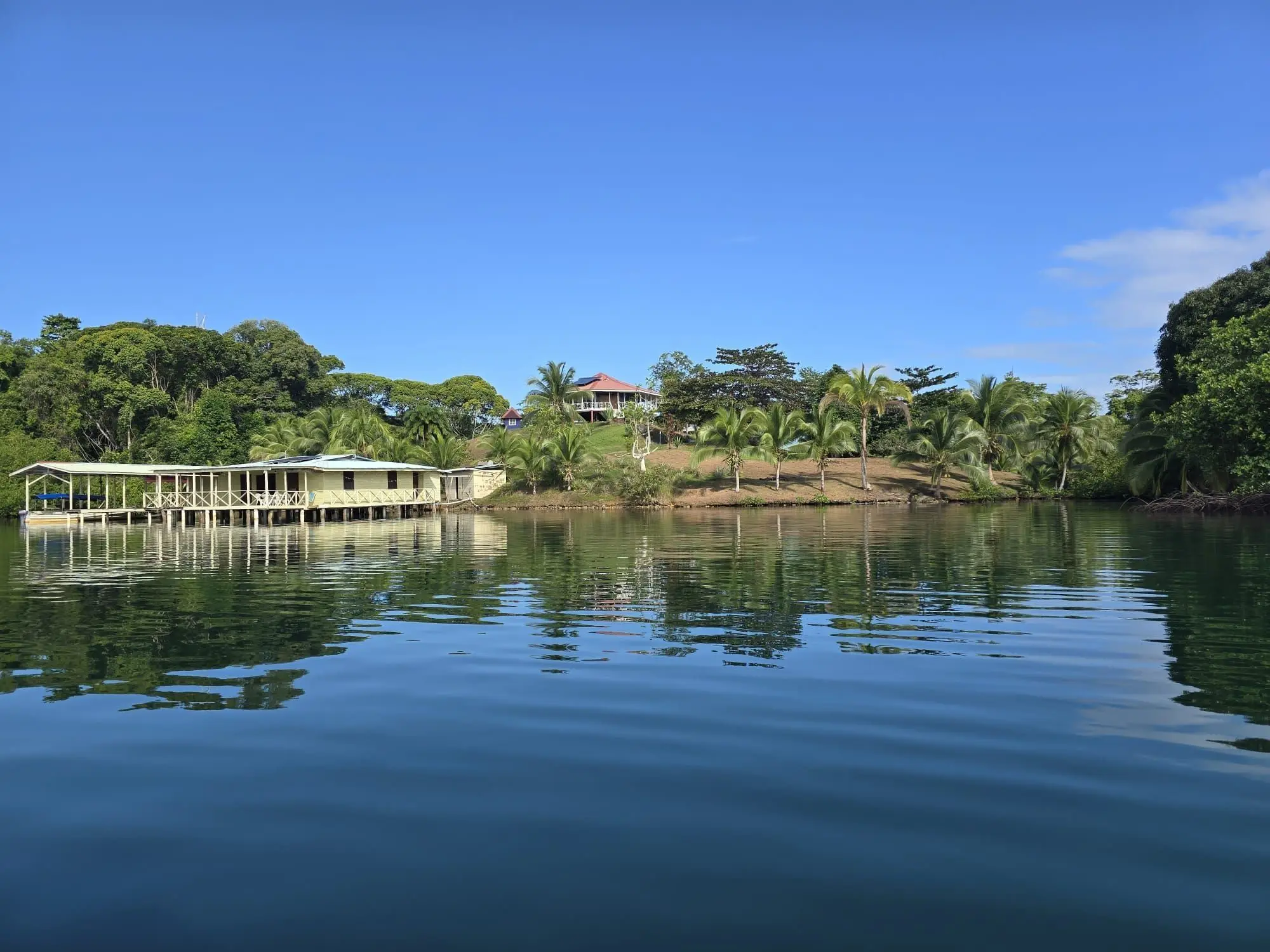 The Convergence retreat property in Bocas del Toro, Panama, seen across the calm Caribbean water